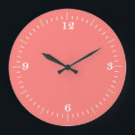 Reloj de la pared de coral<br><div class="desc">Reloj coral, sencillo, clásico, moda.</div>