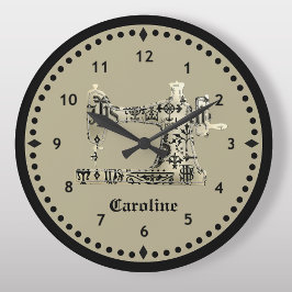 Reloj de máquina de coser negro y blanco