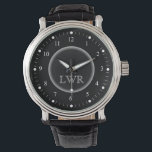 Reloj de monograma blanco y negro masculino<br><div class="desc">Elegante y elegante, limpio y simple relojes monogramados personalizados para el hombre especial en su lista de regalos. Clásico fácil de leer números blancos con marcas hash en la cara negra. Negrita y sofisticada para caballeros de estilo tradicional — haga clic en Personalizar para cambiar el tamaño de letra, estilo...</div>