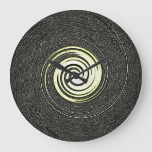 Reloj de pared abstracto negro y dorado