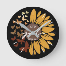 Reloj de pared acrílico con girasol y mariposas