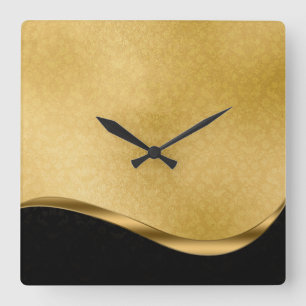 Reloj de pared acrílico negro y dorado