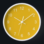 Reloj de pared amarillo mostaza<br><div class="desc">Reloj de pared amarillo mostaza. Sencillo diseño minimalista de color mostaza con horas blancas.</div>
