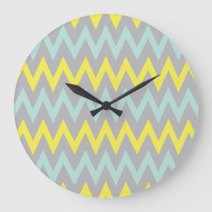 Reloj de pared amarillo y turquesa