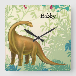 Reloj de pared amistoso del dinosaurio del