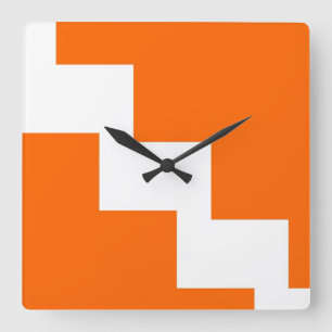Reloj de pared anaranjado de Chevron
