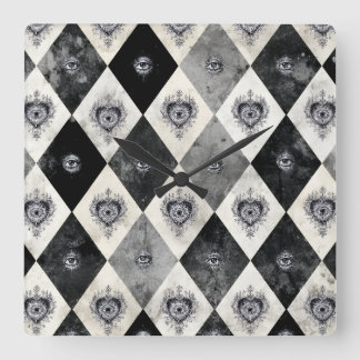 Reloj de pared Arlequín con ojos que todo lo ven