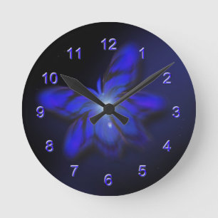 Reloj de pared azul de la mariposa del resplandor
