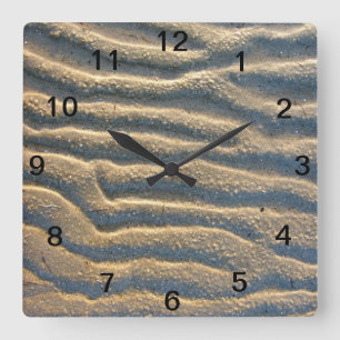 Reloj de pared beige de playa de arena