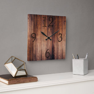 Reloj de pared con aspecto de madera oscura y espl
