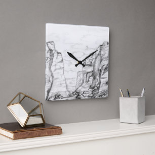 Reloj de pared con cañón dibujado en blanco y negr