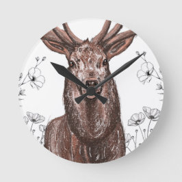 Reloj de pared con diseño de venado con flores.