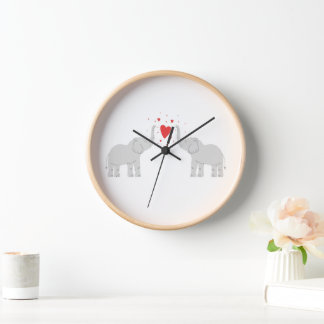 Reloj de pared con elefantes enamorados