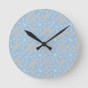 Reloj de pared con patrón floral de flor azul