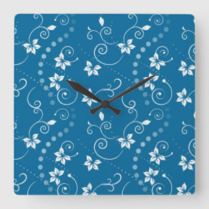 Reloj de pared cuadrado con flores de remolino azu