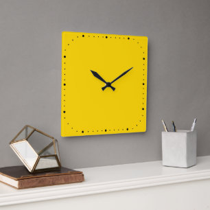 Reloj de pared cuadrado dorado sin números