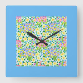 Reloj de pared cuadrado Primroses, borde turquesa