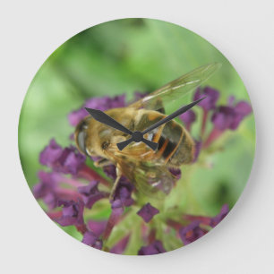 Reloj de pared de abejas y flores moradas