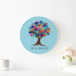 Reloj de pared de árbol con salpicaduras de pintur