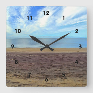 Reloj de pared de arena morada y playa