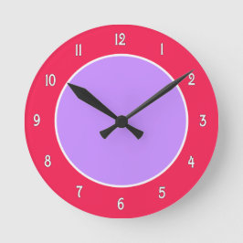 Reloj de pared de bloques de color púrpura y fucsi