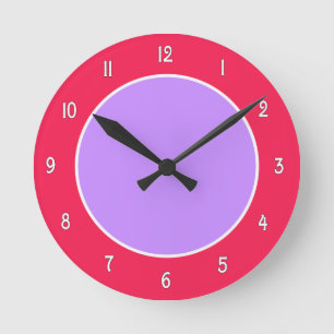 Reloj de pared de bloques de color púrpura y fucsi