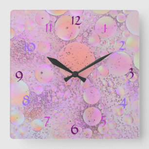 Reloj de pared de burbujas moderno morado y rosado