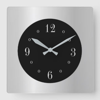 Reloj de pared de cara negra y plateado liso
