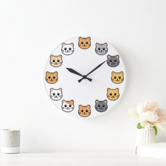 Reloj de pared de caras de gato de dibujos animado