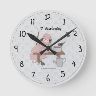 Reloj de pared de chica de jardín de campo