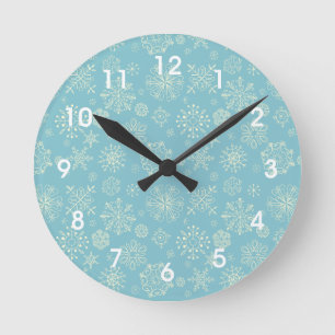 Reloj de pared de copos de nieve en invierno azul