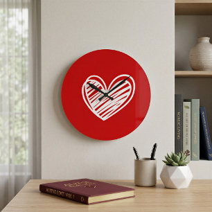 Reloj de pared de corazón rojo elegante