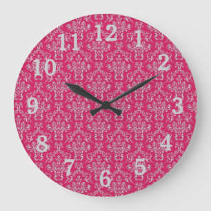Reloj de pared de damasco rosa y plateado con núme