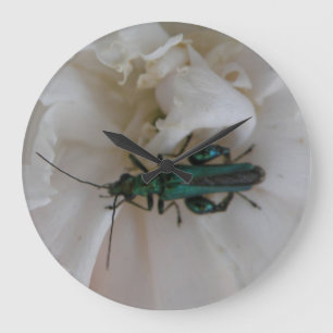 Reloj de pared de escarabajo de flores