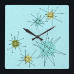 Reloj de pared de estallidos atómicos del huevo az<br><div class="desc">Este modelo de reloj de pared acrílico de la pared atómica Icónica azul del huevo de Robin presenta estallidos atómicos icónicos. ¡Así es! La vieja escuela, el fondo de color azul óvulo de robin con especkles de oro, es el telón de fondo perfecto para los vibrantes círculos turquesa, apasionante apio...</div>
