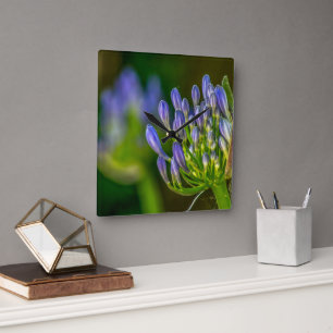 Reloj de pared de flor púrpura