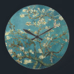 Reloj de pared de flores de almendra<br><div class="desc">Florecimiento de Almond por Vincent van Gogh La flor de almendras fue pintada en 1890 en honor a un evento especial en la vida de Vincent. El 31 de enero, el hermano de Vincent, Theo, y su esposa Johanna, tuvieron un hijo, y lo llamaron Vincent Willem. Vincent pintó esta rama...</div>