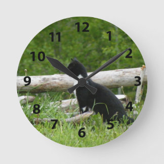 Reloj de pared de gato negro y blanco