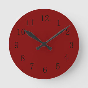 Reloj de pared de la cocina roja más oscuro