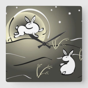 Reloj de pared de los conejitos de la luna