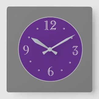 Reloj de pared de los tonos gris y morado