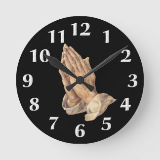 Reloj de pared de manos para rezar