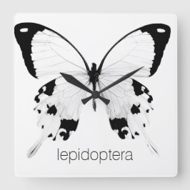 reloj de pared de mariposa en blanco y negro