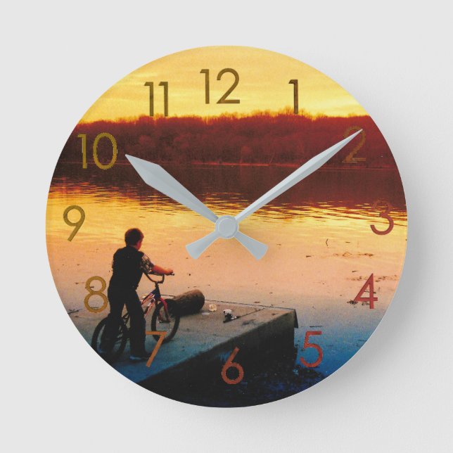 Reloj de pared de niño en bicicleta al atardecer (Anverso)
