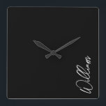 Reloj de pared de nombre personalizado de guión mo<br><div class="desc">Regalos de nombres personalizados Minimalistas modernos Este diseño presenta un nombre personalizado en blanco y moderno tipo de letra de escritura a mano sobre fondo negro.</div>