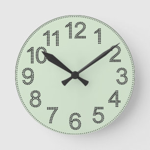 Reloj de pared de números punteados en verde menta