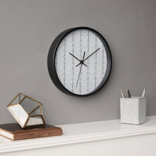 Reloj de pared de patrón retro en blanco y negro