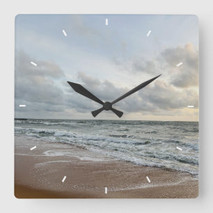 Reloj de pared de playa de puesta de sol en el océ