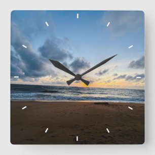 Reloj de pared de playa de puesta de sol en el océ