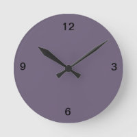 Reloj de pared de plumas